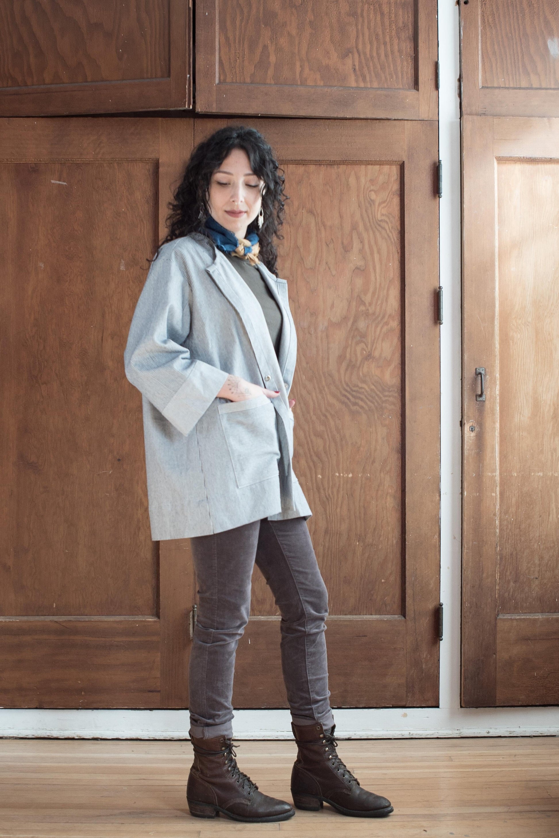 Side view of model wearing Lab Coat.