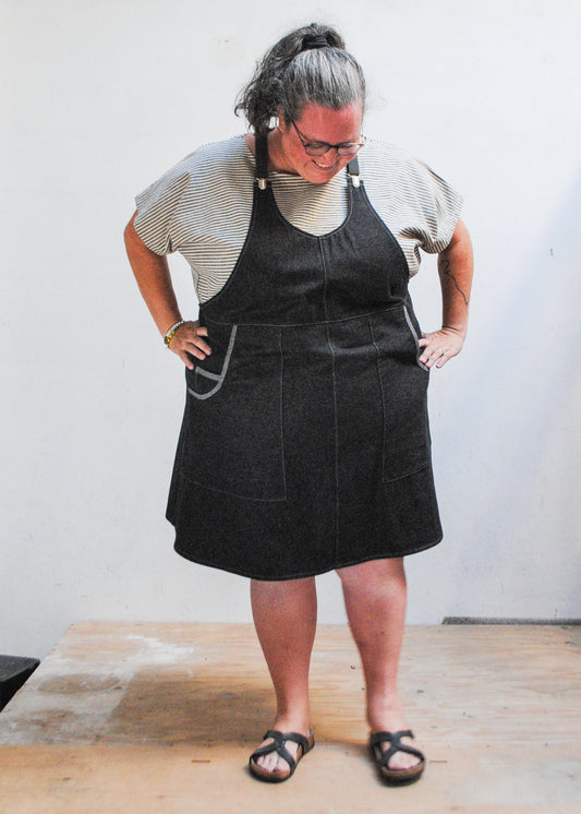 Black denim apron dress with adjustable grey suspenders, handmade in Astoria Oregon