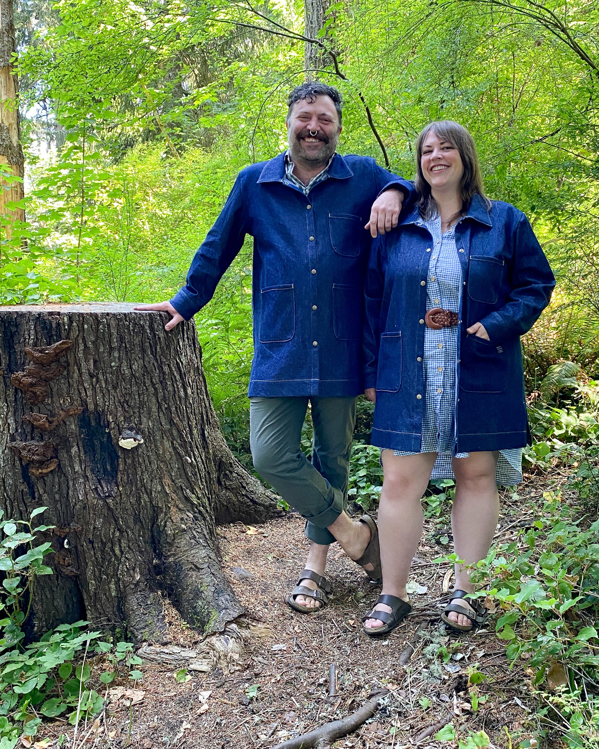 Male and female models both wearing the Large Denim Jacket.