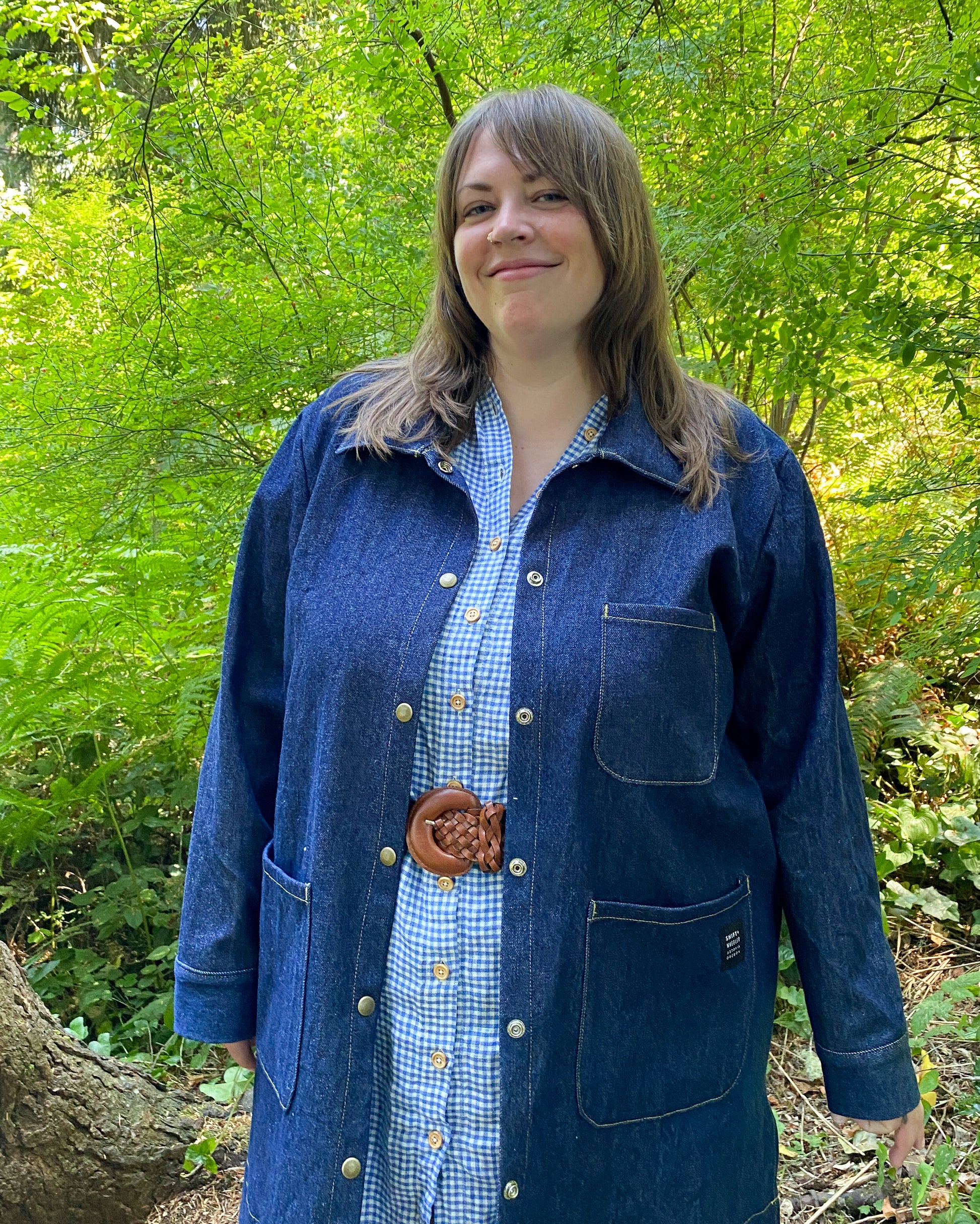 Lady model wearing the Large Denim Jacket. 