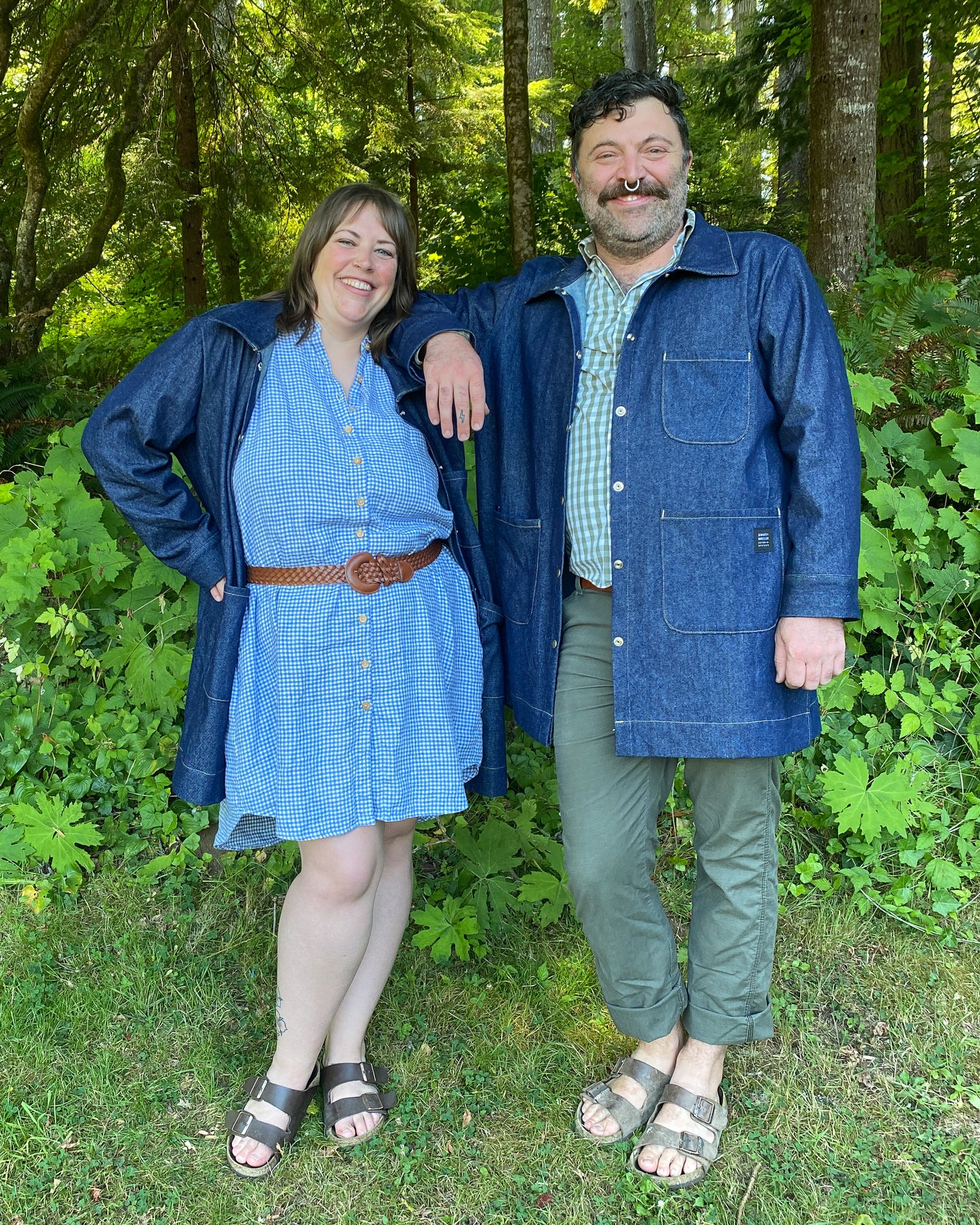 Male and female models both wearing the Large Denim Jacket. 