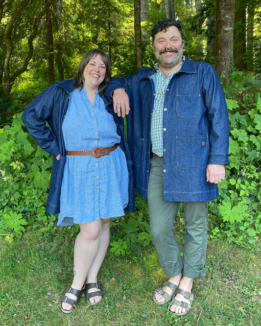 Male and female models both wearing the Large Denim Jacket.