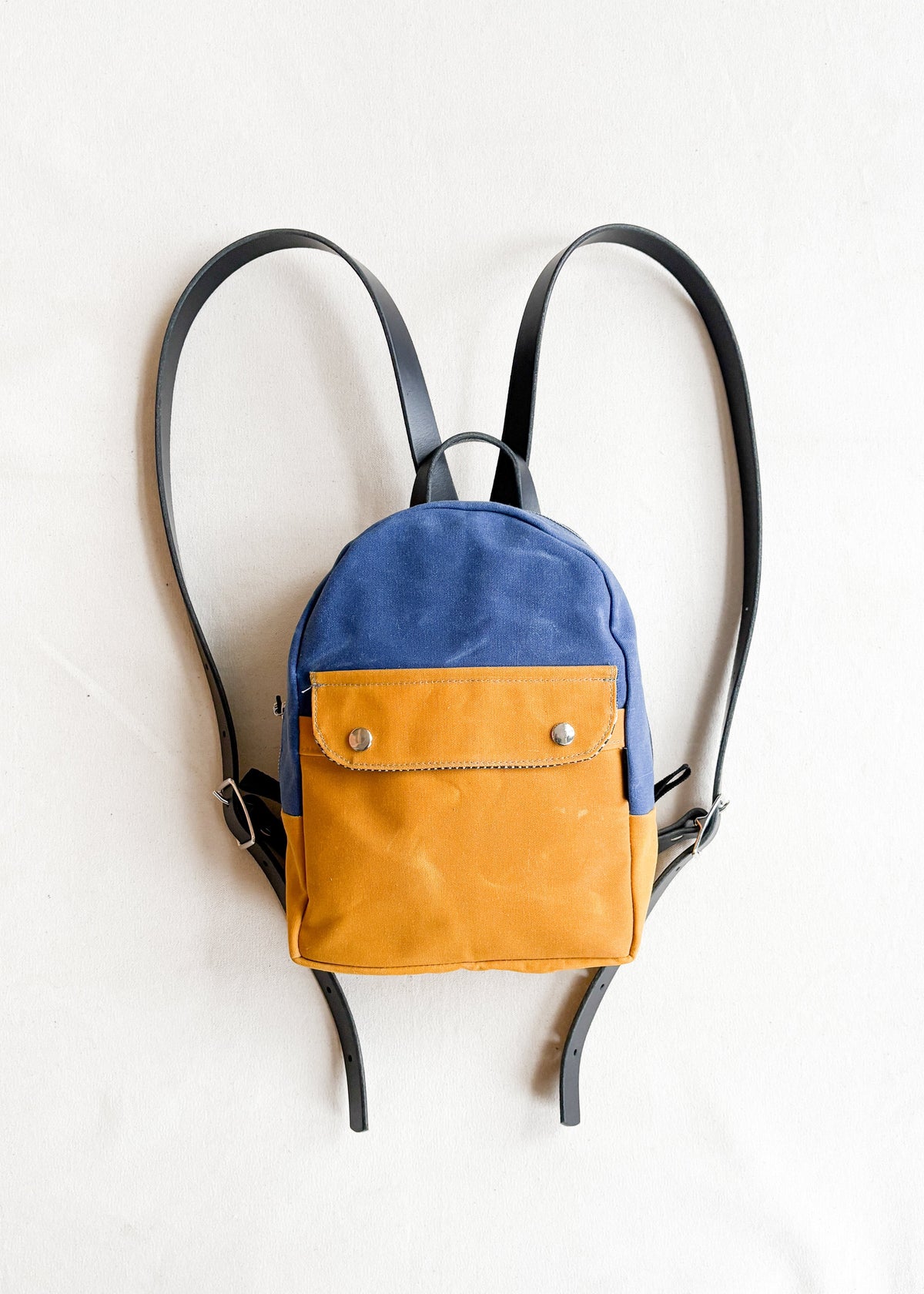 2-tone gold yellow and royal handmade Shift + Wheeler waxed canvas mini backpack