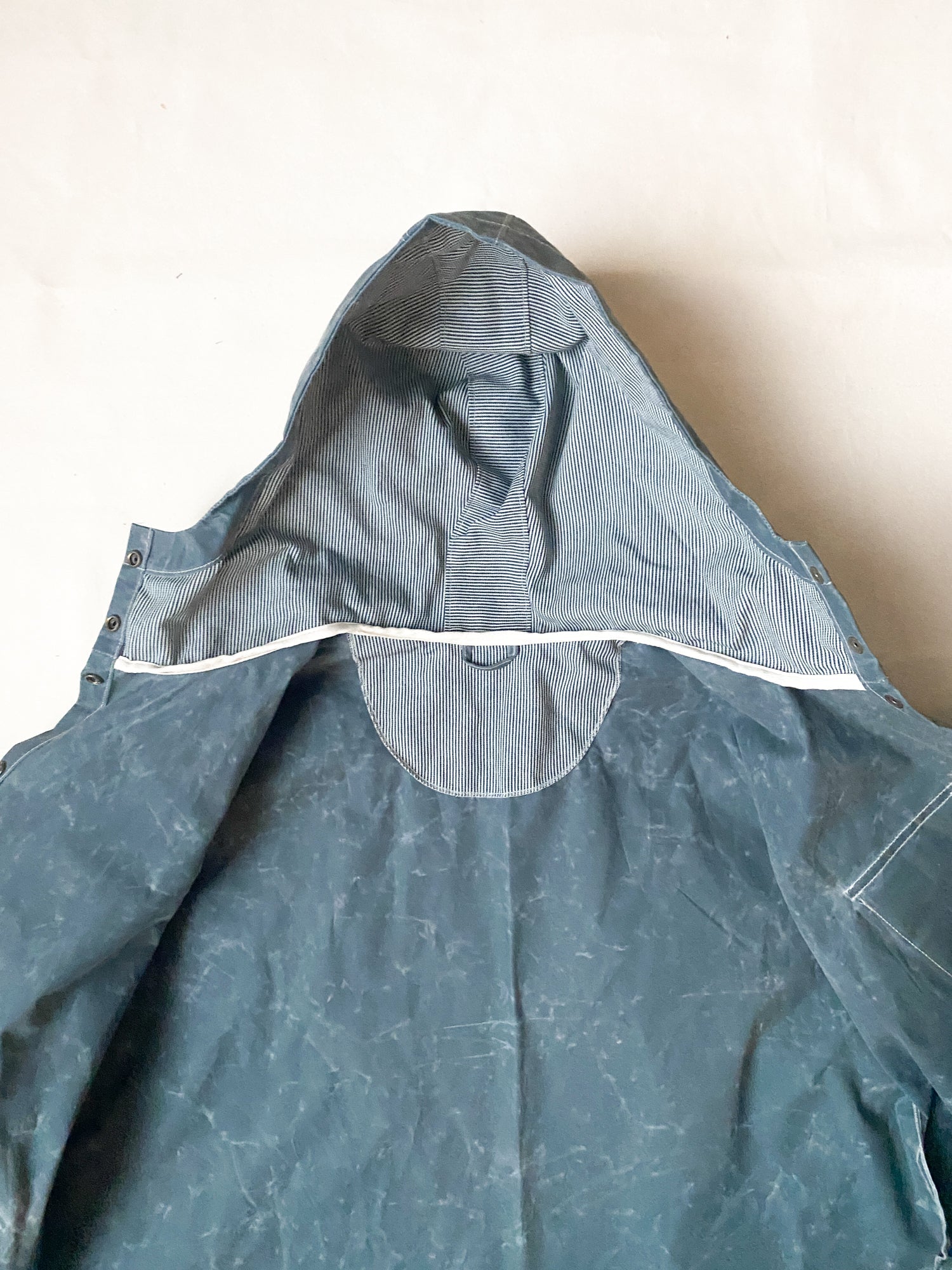 Inside detail of Waxed Canvas Raincoat in Slate.