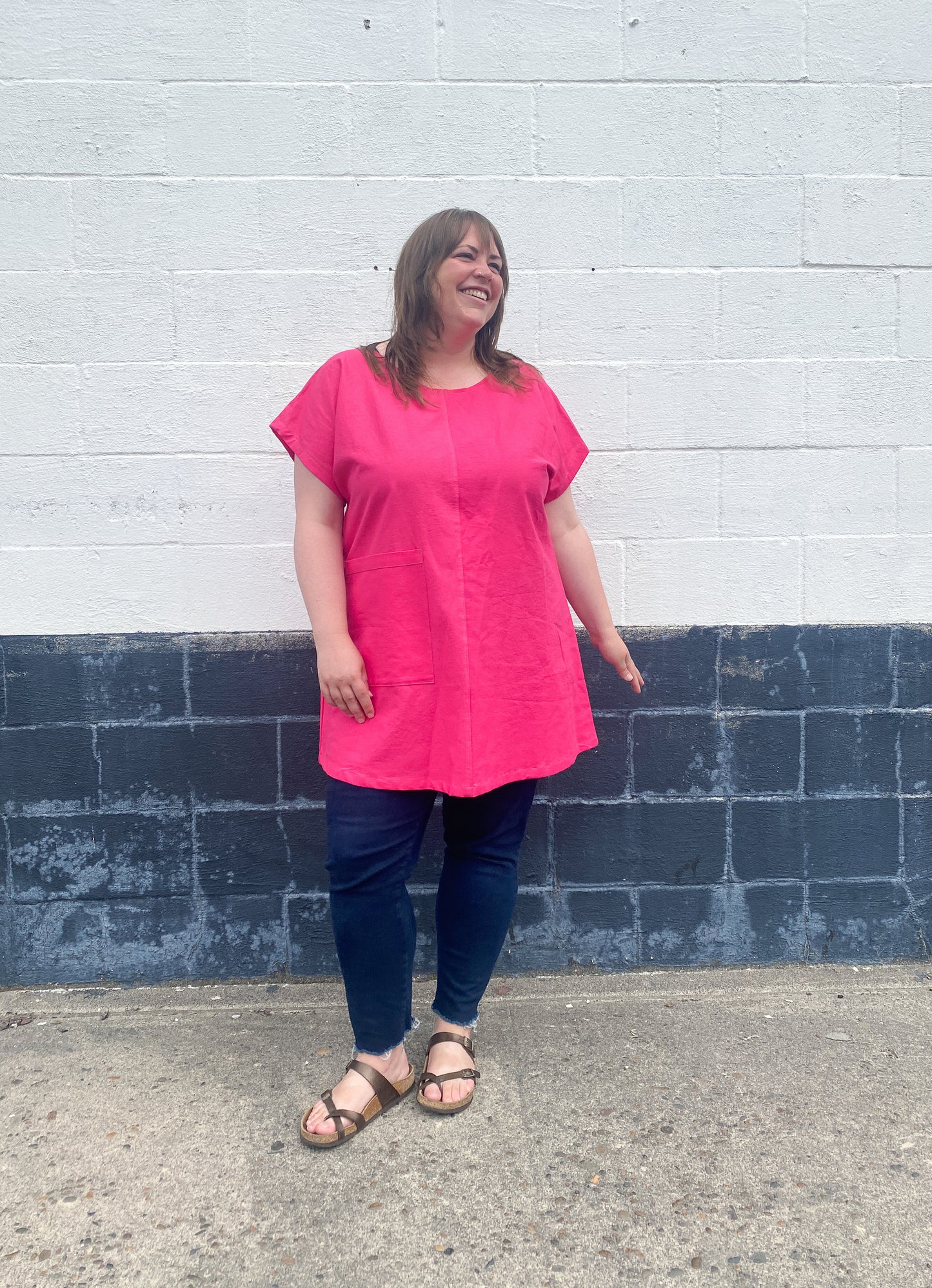 Brightest pink tunic with weirdly satisfying tan topstitching, and one giant pocket. 55% linen, 45% cotton, medium weight.