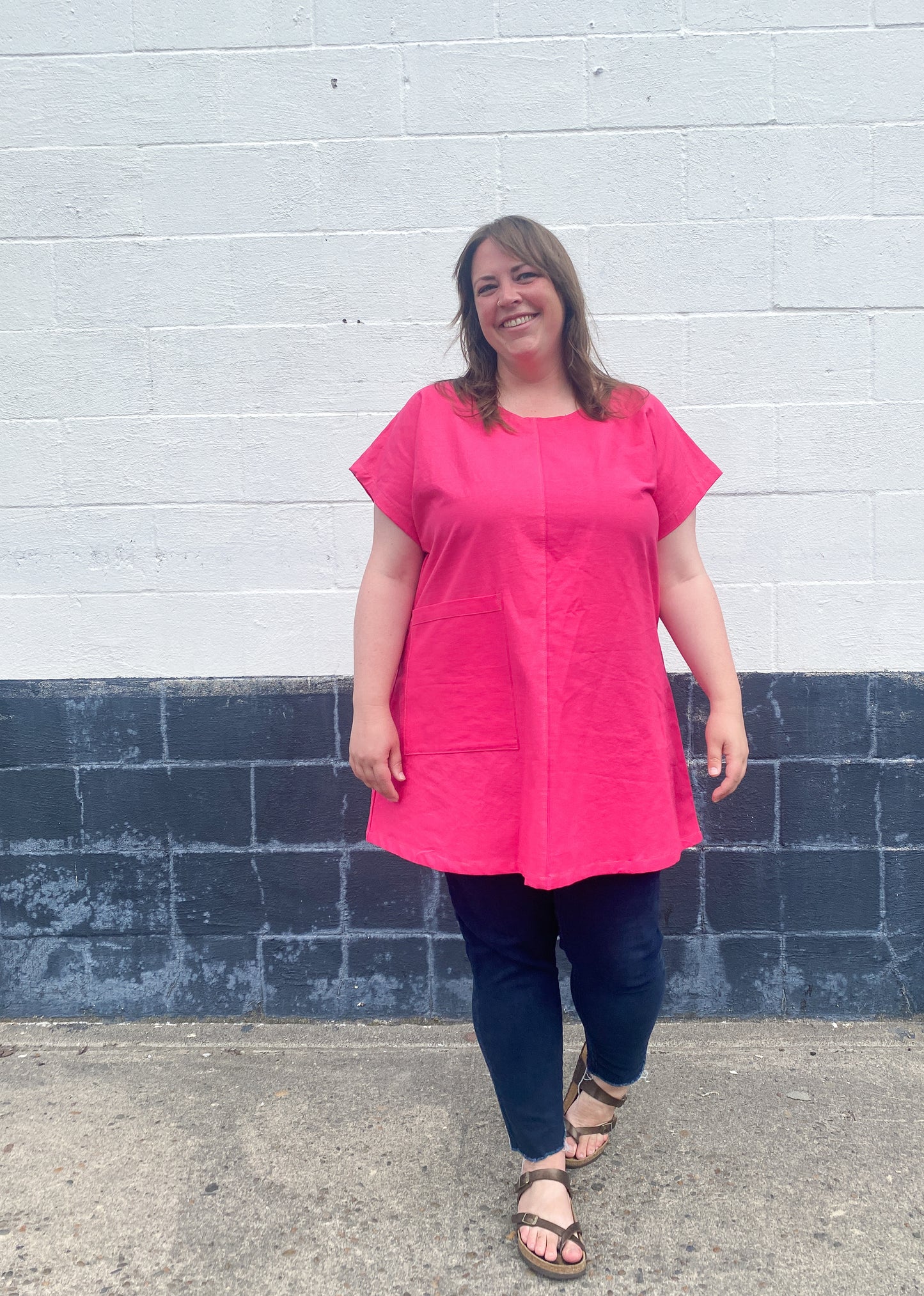Brightest pink tunic with weirdly satisfying tan topstitching, and one giant pocket. 55% linen, 45% cotton, medium weight.