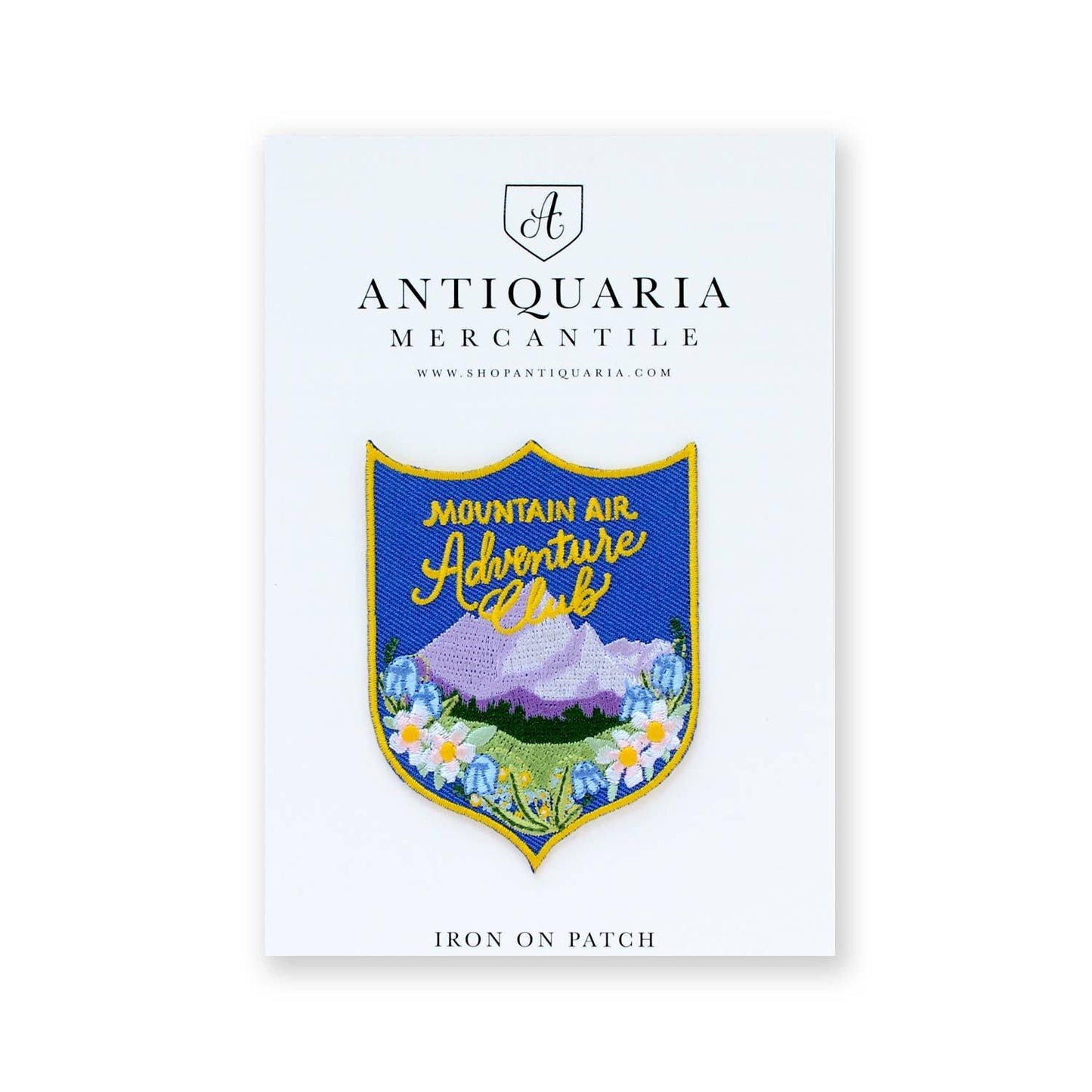 Mountain Air Adventure Club Embroidered Patch in Antiquaria Mercantile packaging
