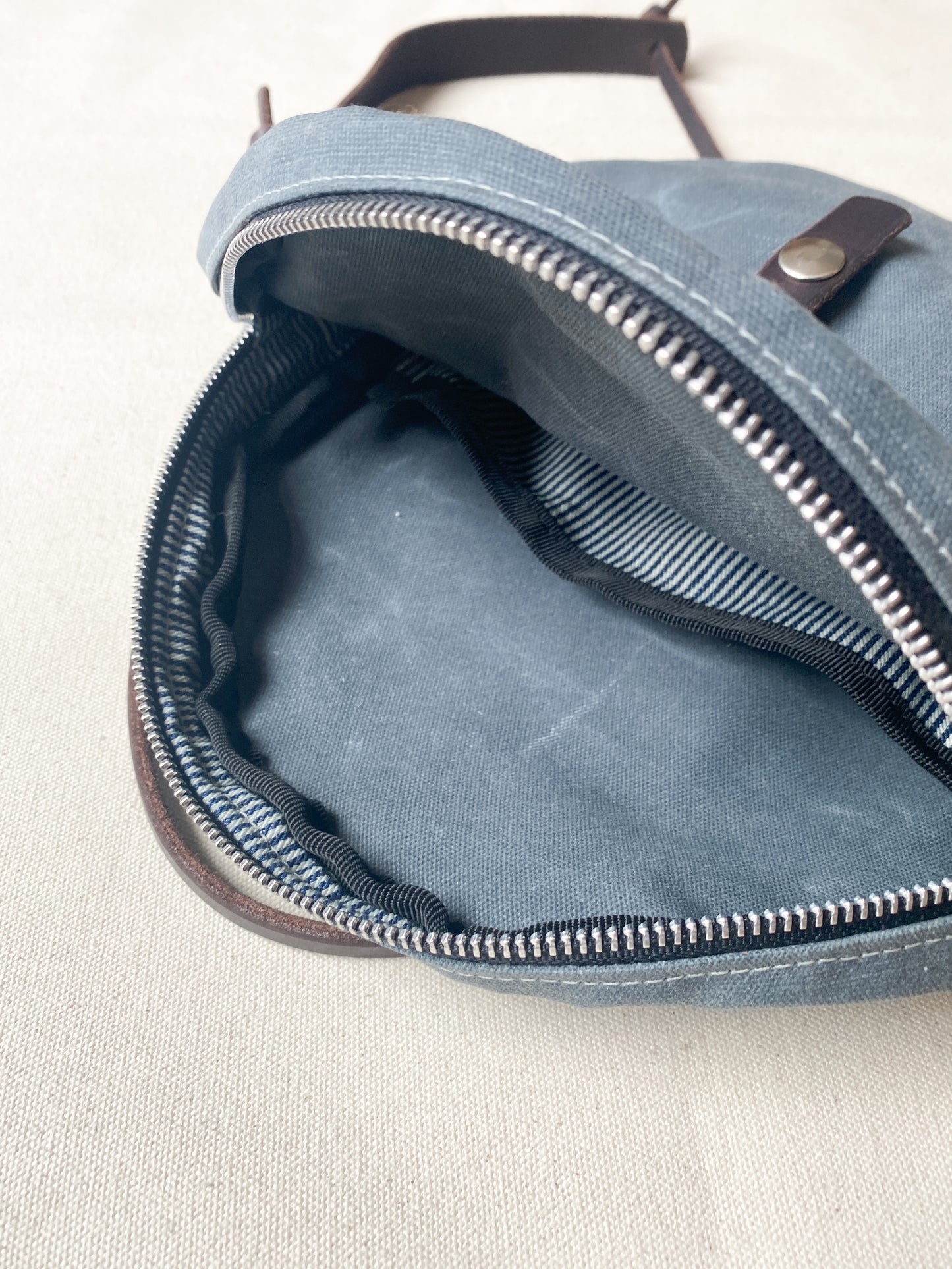 Inside of circle bag in slate.