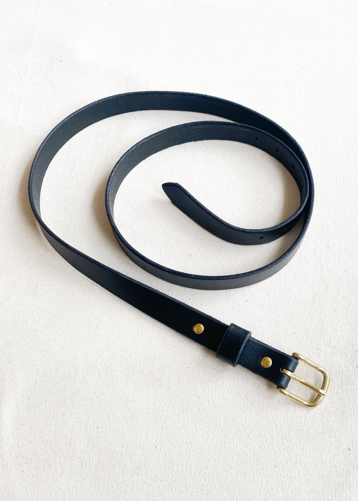 1" black leather belt with brass buckle