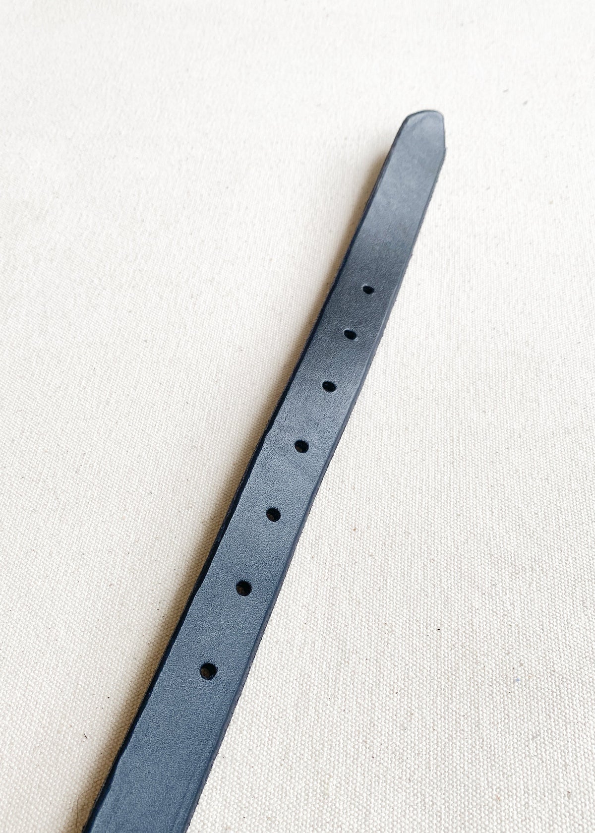Details of 1" wide black leather belt