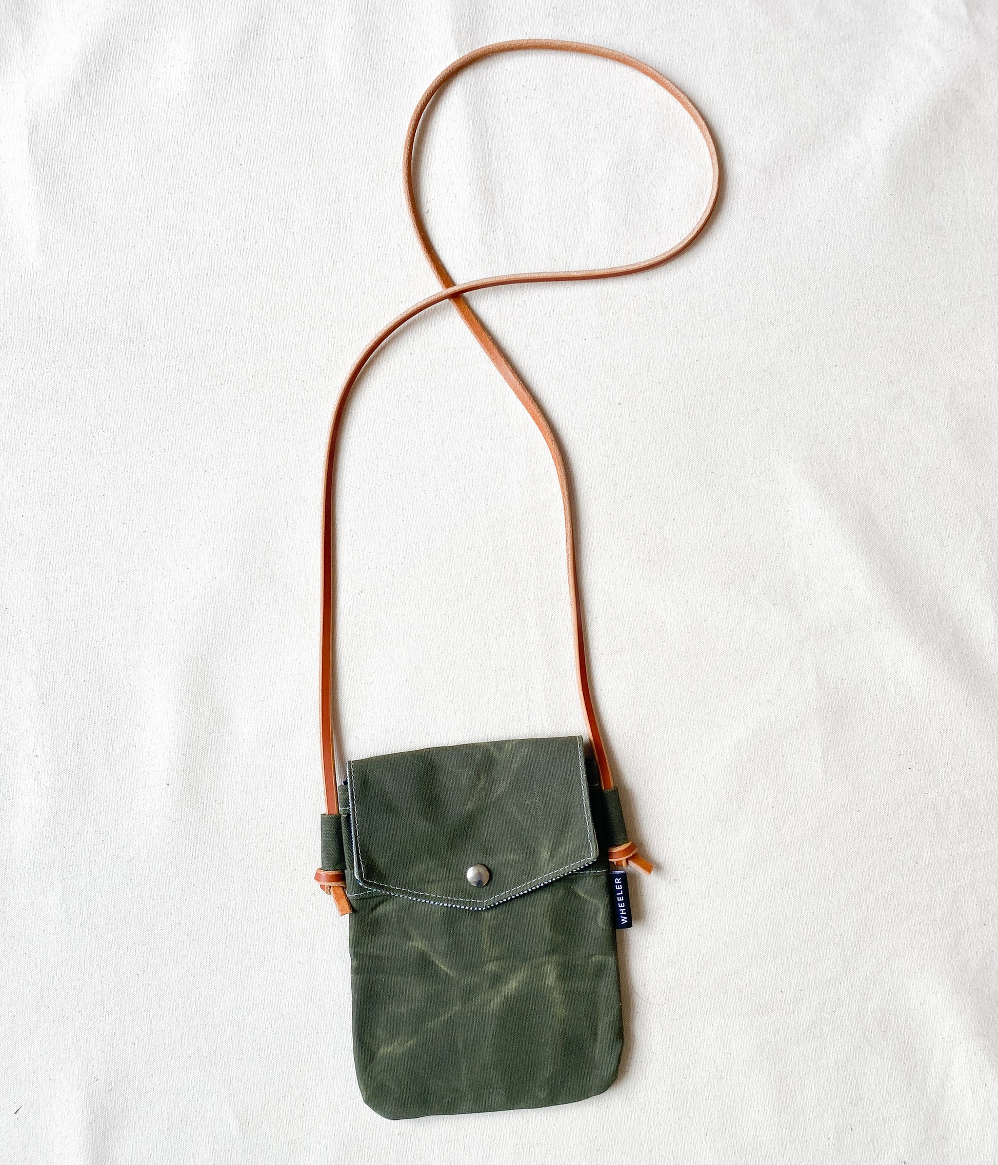 Waxed Canvas Simple Crossbody in all olive. 