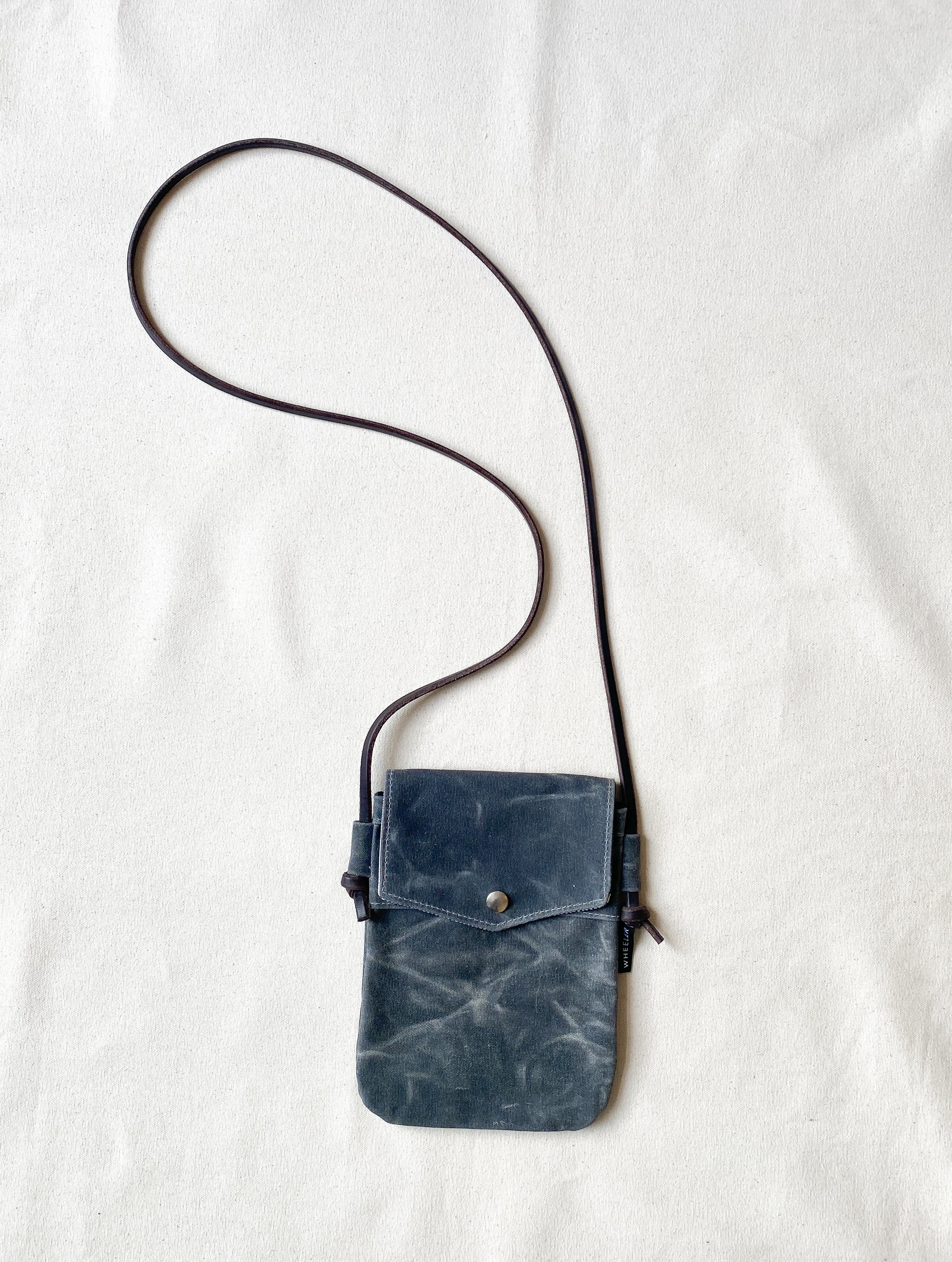 Stitch & Rivet waxed canvas and leather crossbody day bag in slate blue  gray — Stitch & Rivet