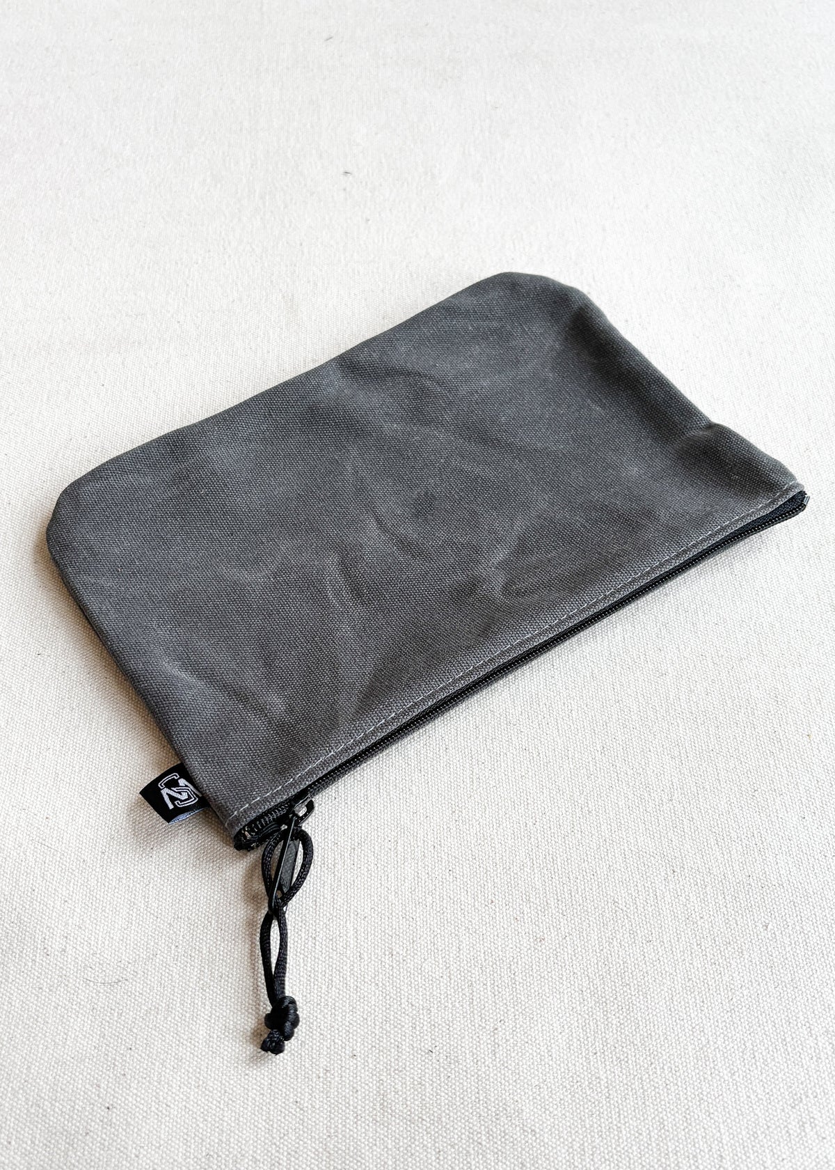 Large waxed canvas zipper pouch in grey