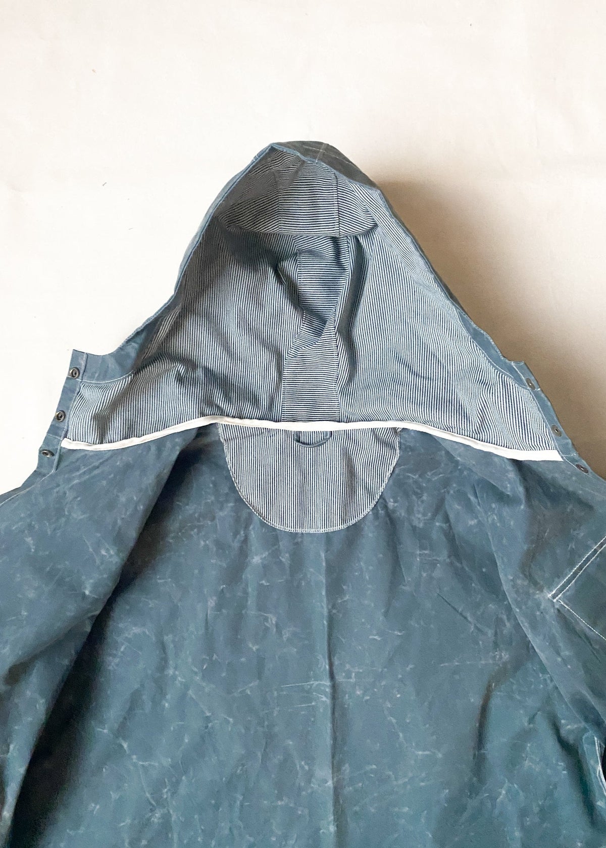 Inside detail of Waxed Canvas Raincoat in Slate.