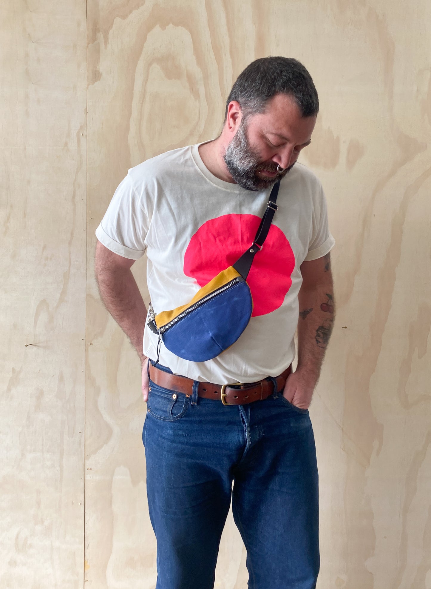 Handmade waxed canvas fanny pack with adjustable leather strap, front view, made in Astoria Oregon USA