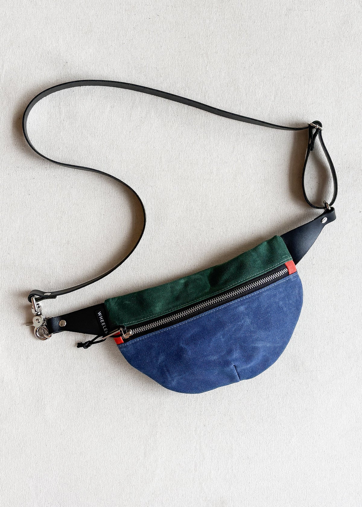 Handmade waxed canvas fanny pack in 2-tone (royal blue and forest green)