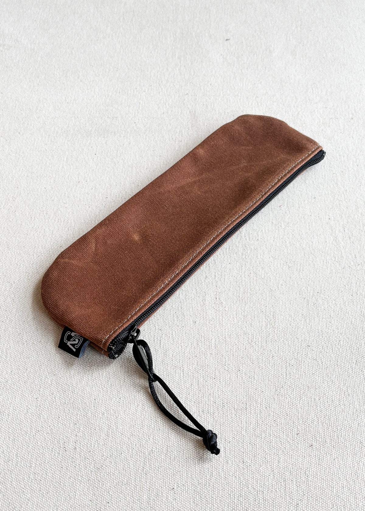 Shift + Wheeler waxed canvas pencil pouch in brown