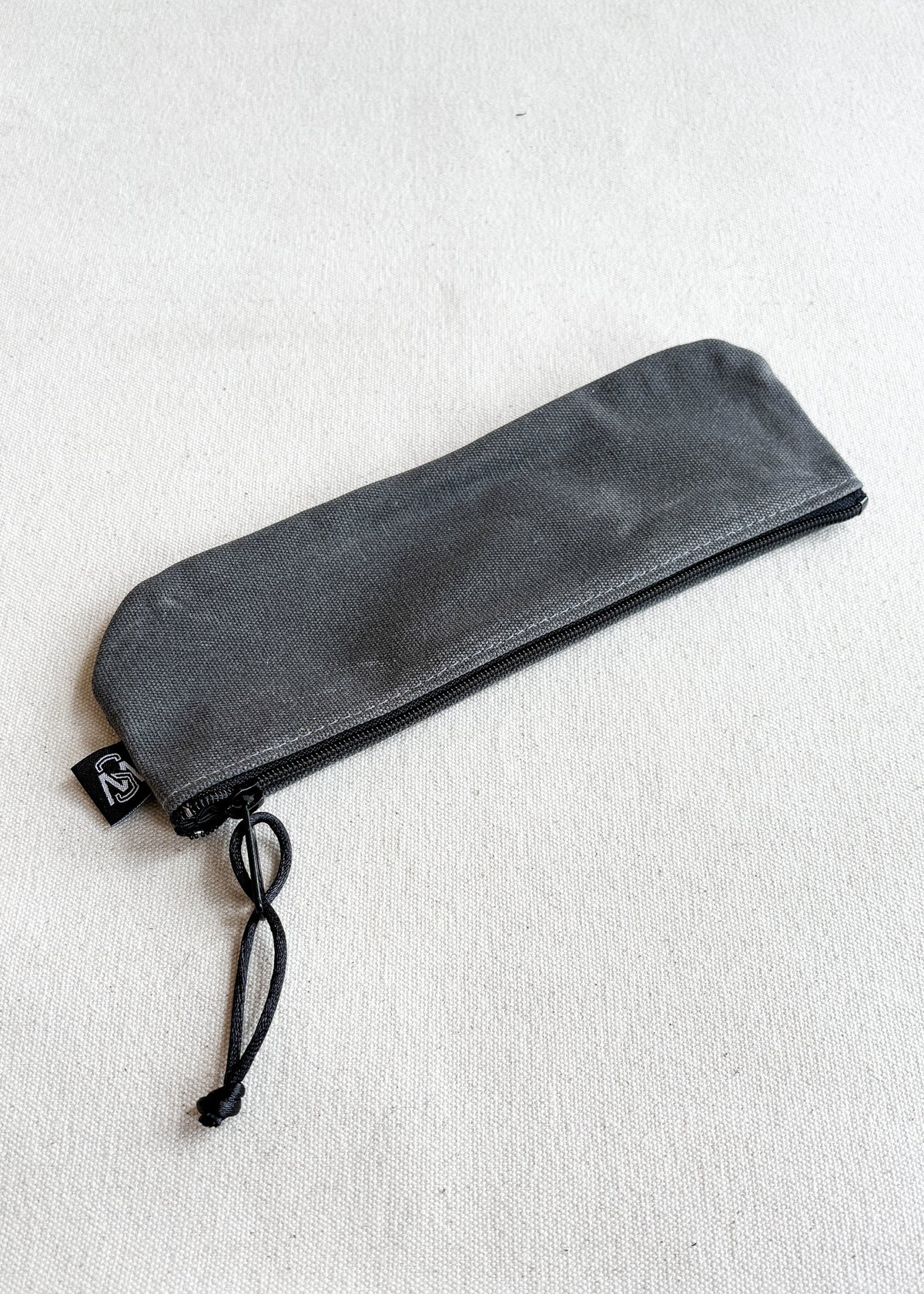 Shift + Wheeler waxed canvas pencil pouch in charcoal