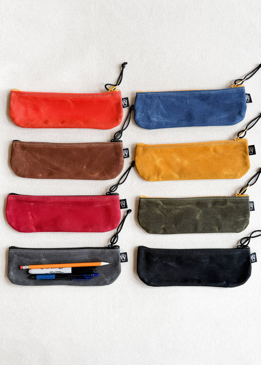 Assortment of Shift + Wheeler waxed canvas pencil pouches