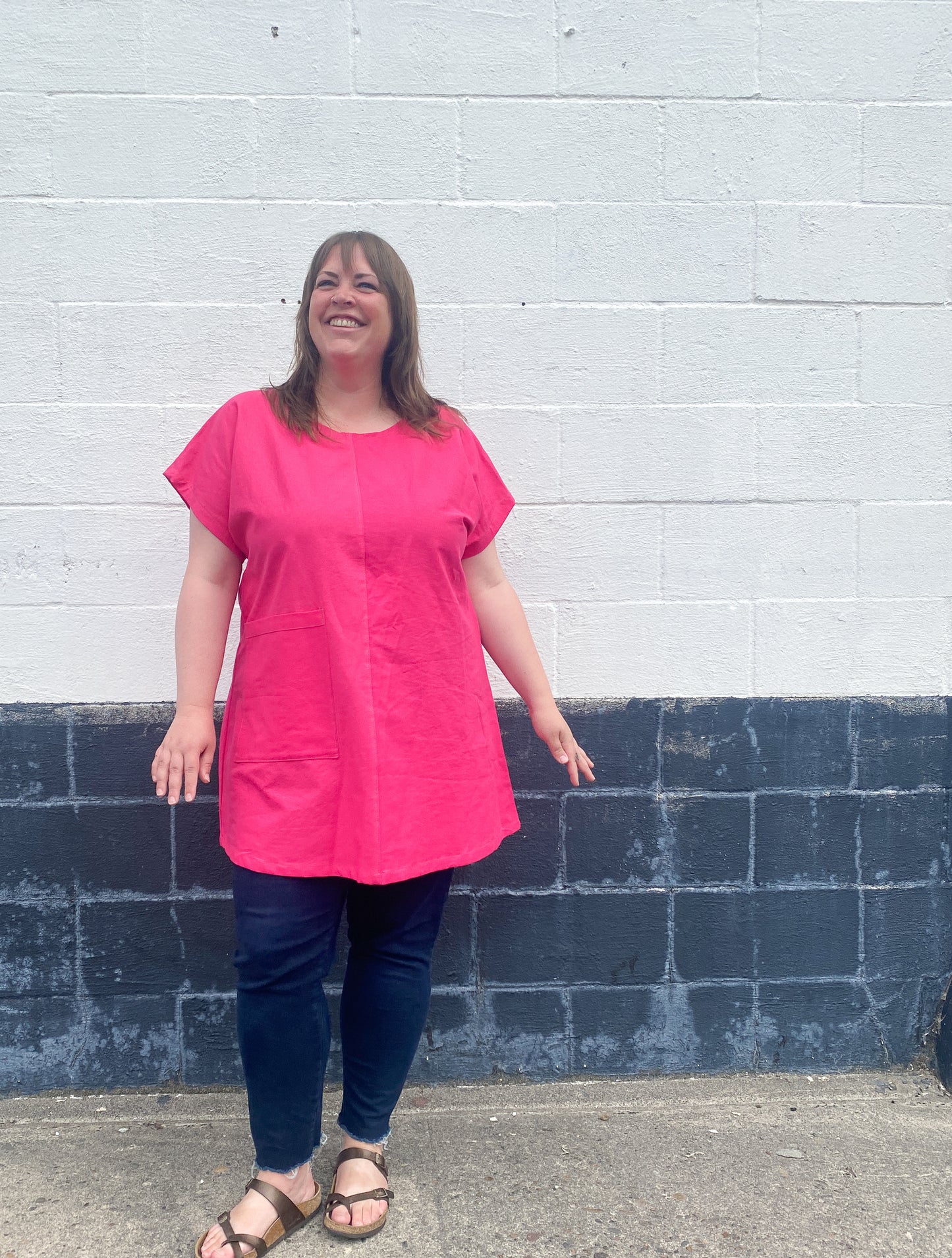 Brightest pink tunic with weirdly satisfying tan topstitching, and one giant pocket. 55% linen, 45% cotton, medium weight.