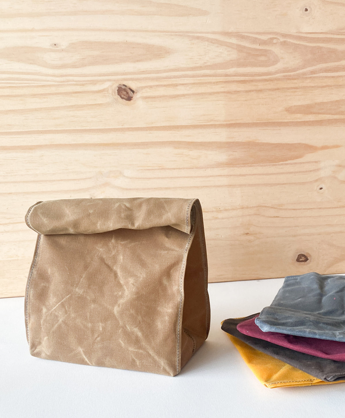 Waxed Canvas Lunchbag shown with available colors