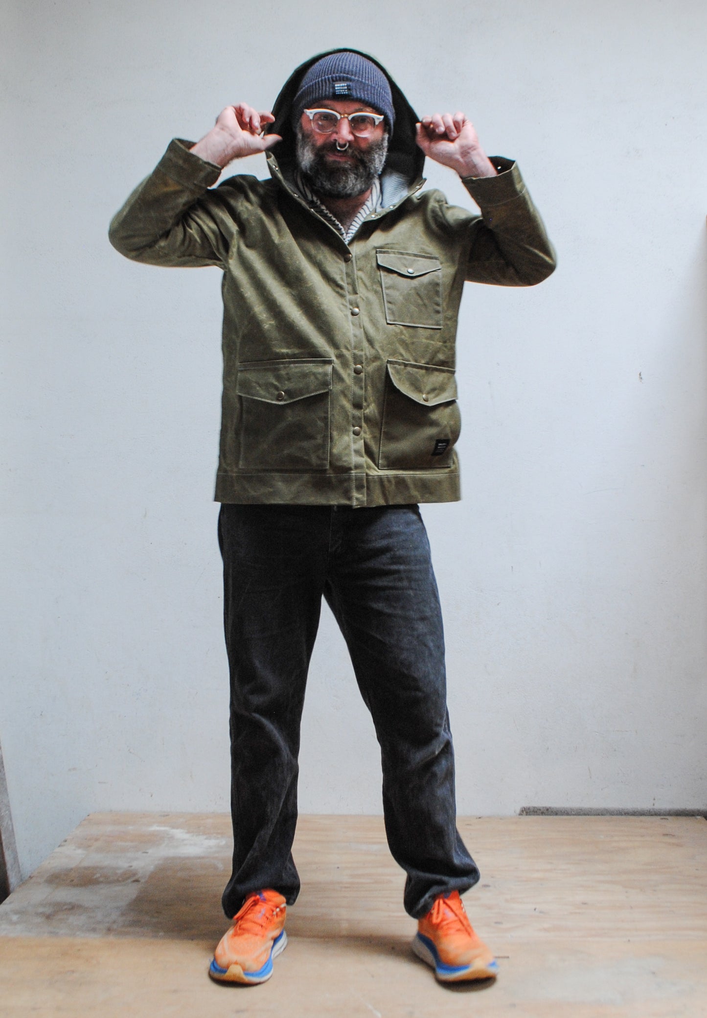 Spacious hood on a waxed canvas rain jacket