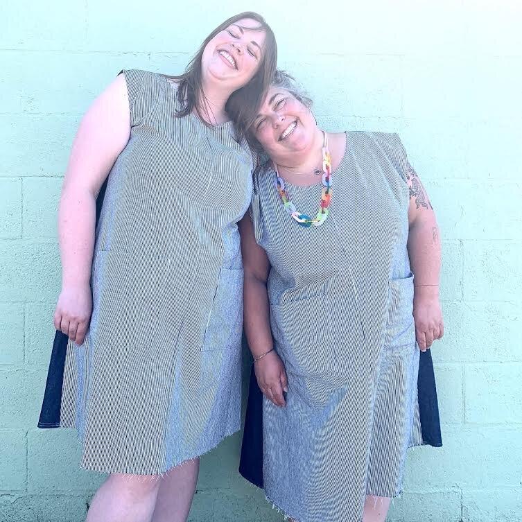 Front view of Denim Play Dress on two models.
