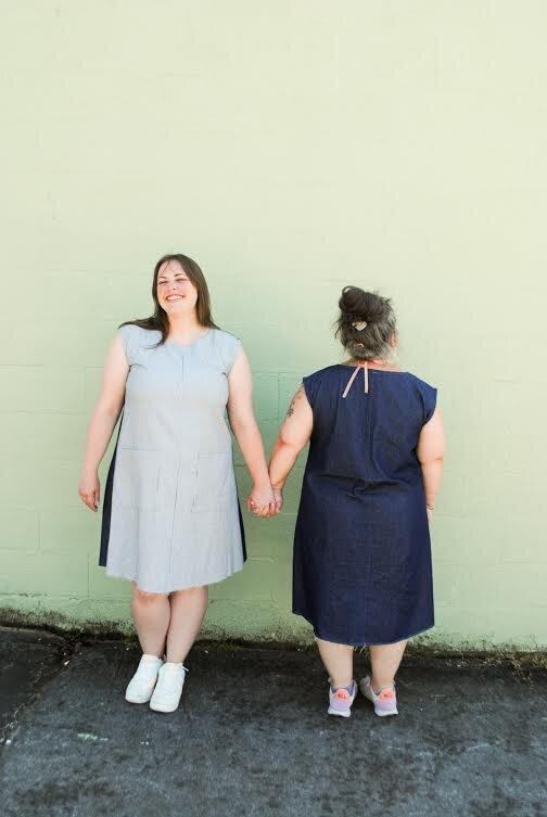 Front and back view of Denim Play Dress on two models.