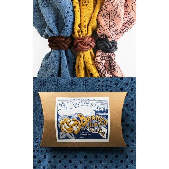 Make Your Own- Braided Scarf Slide Kit, in package and displayed on scarves.