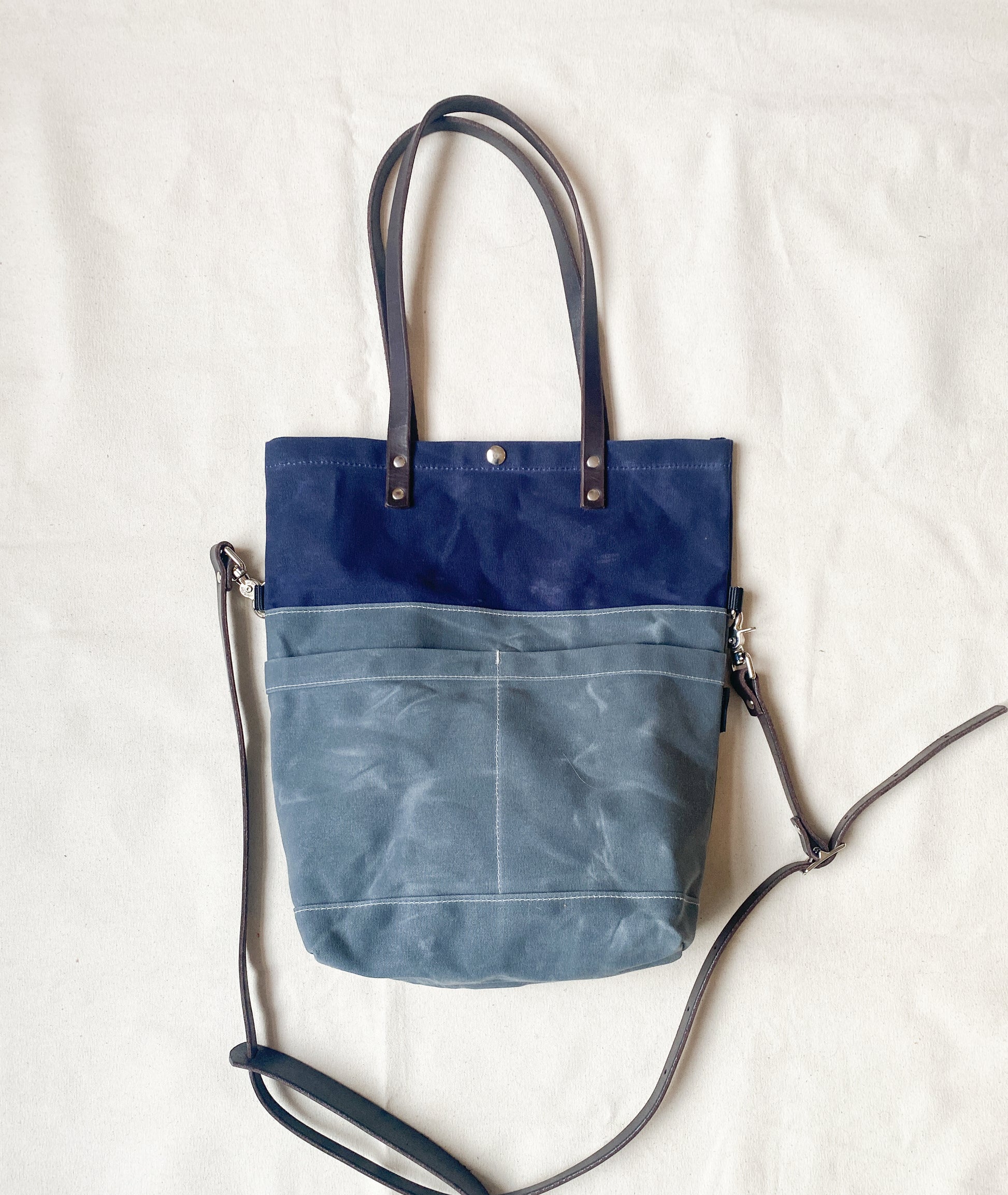 Convertible tote in slate and blue. 