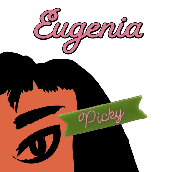 "Picky" hair clip in apple green acetate with pink ink displayed on art with "Eugenia".