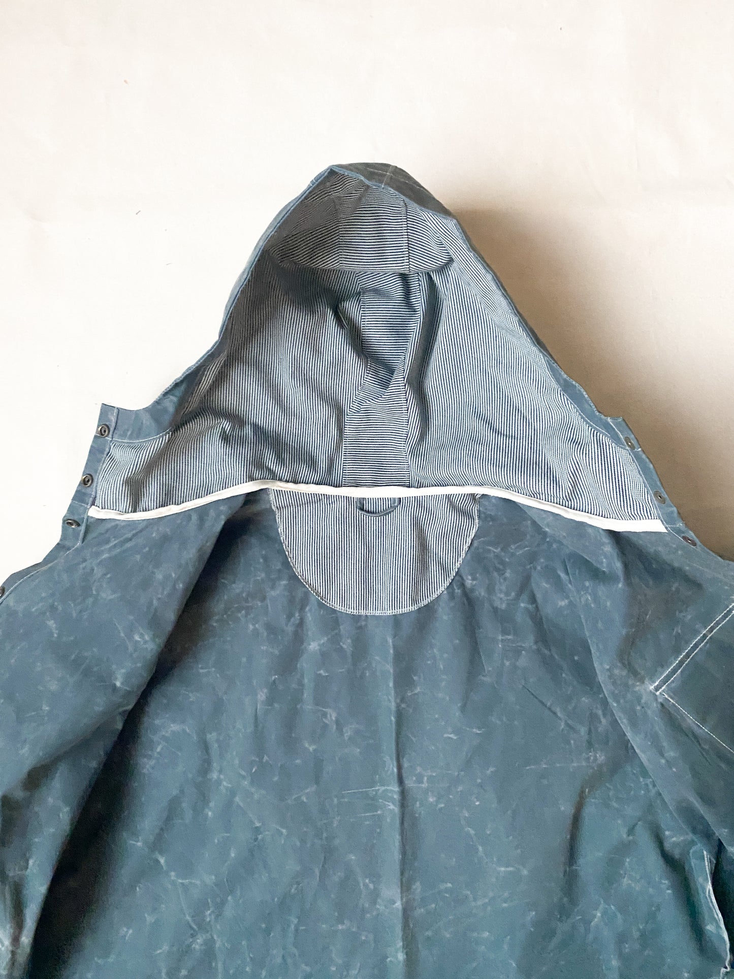 Inside detail of Waxed Canvas Raincoat in Slate. 