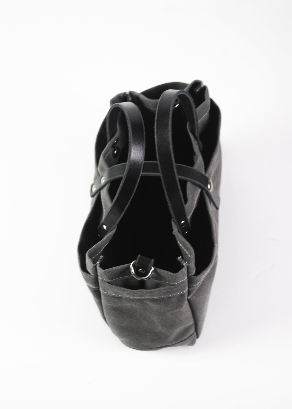 Charcoal, waxed cotton canvas tool bag, top view. 