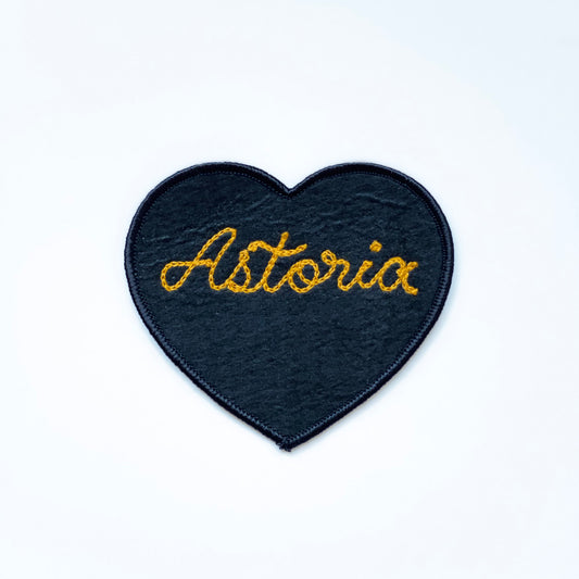 Handmade, custom "Astoria" black felt heart patch with gold embroidery.