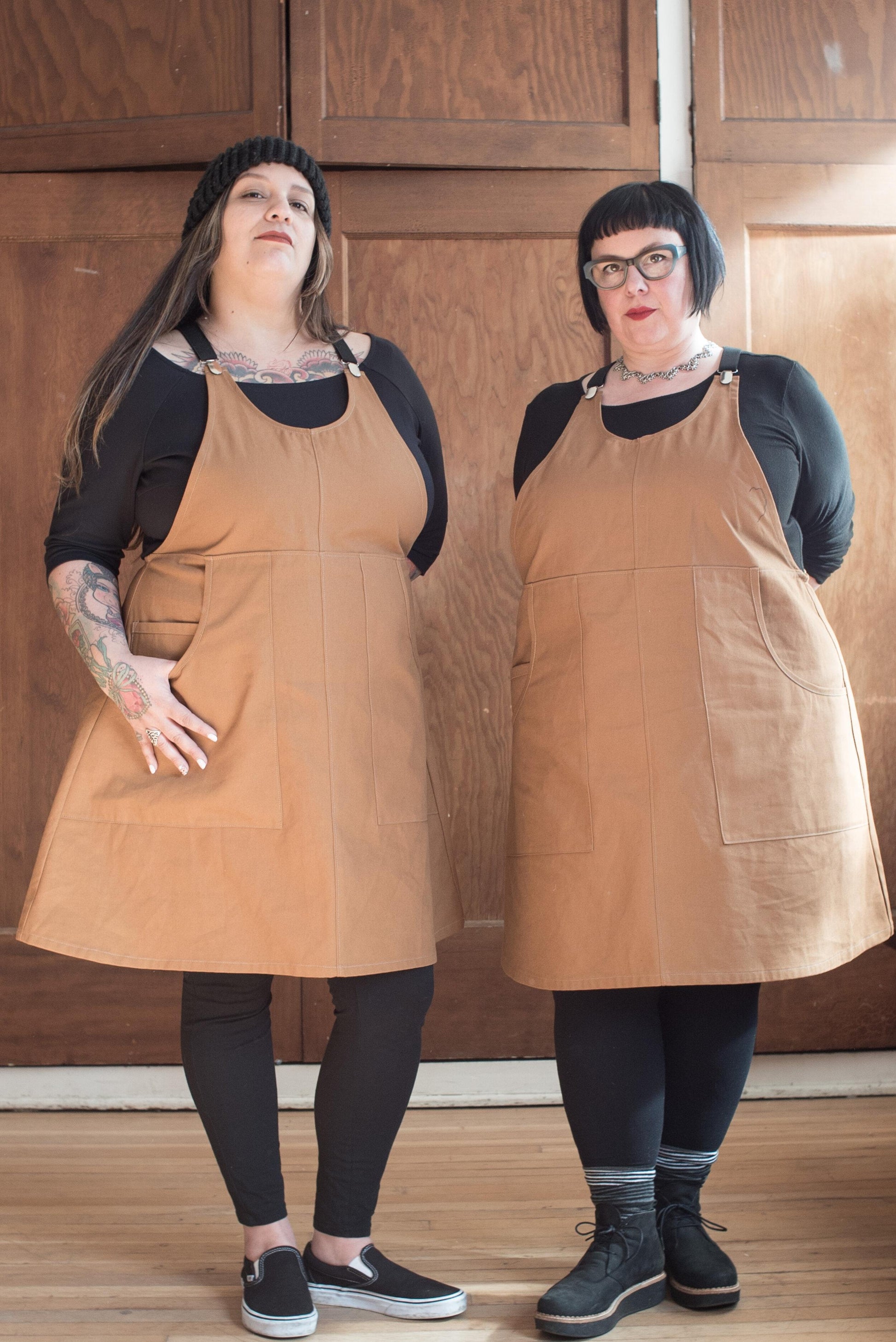 Front view of Caramel Canvas Suspender Dress on two models.