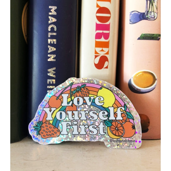 "Love Yourself First" sticker.